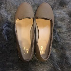 Tan flat shoes